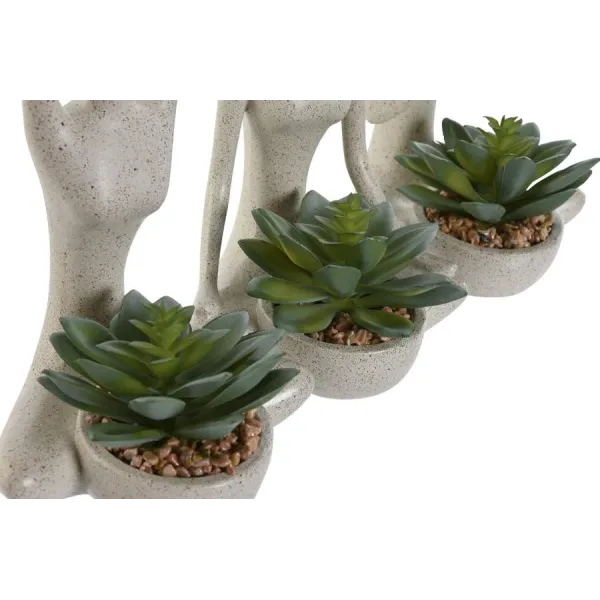 figura con planta yoga marron 2