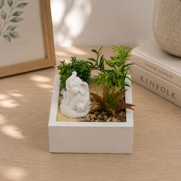 maceta cemento planta y elefante